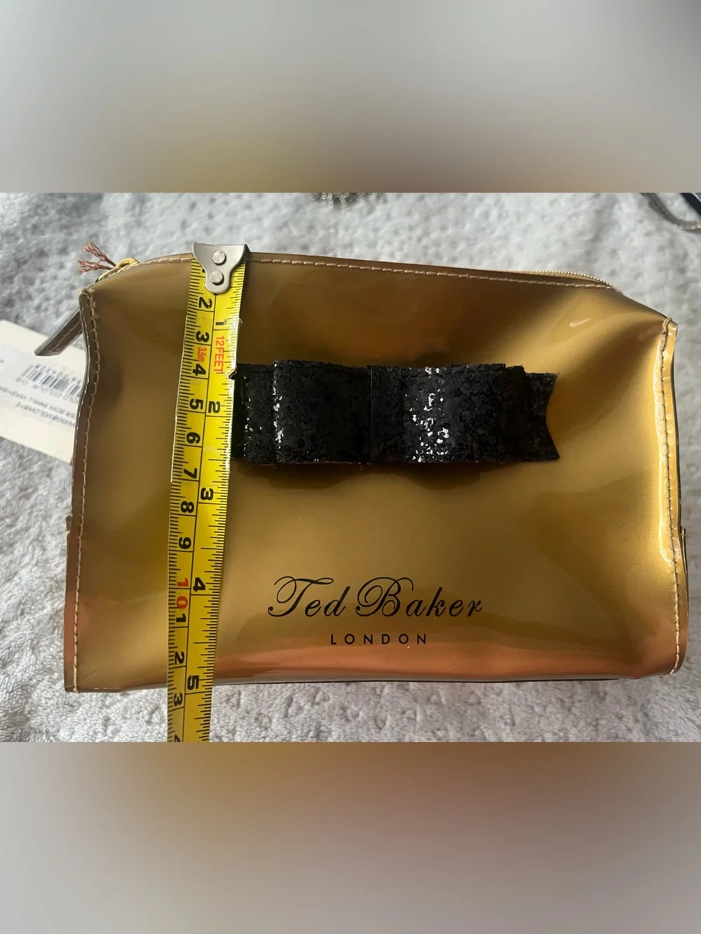 Ted Baker Gold Patent Cosmetic Pouch with Black Sequin Bow